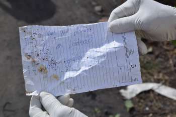 Um bilhete encontrado na cueca da vítima indicava a motivação da morte e a existência de um segundo corpo.