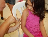 Déborah, 7 anos, tomou apenas a injeção contra o sarampo.