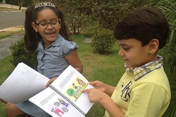 Menino de 7 anos escreve livro para incentivar a irmã de 5 a usar óculos, em Goiânia