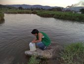 Equipe do IMA coleta amostras do Rio Jacuípe