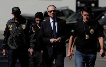 O presidente do Comitê Olímpico Brasileiro (COB) Carlos Arthur Nuzman chega na sede da Polícia Federal após ser preso no Rio de Janeiro.